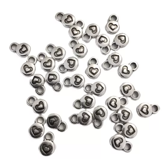 petit pendant pastille avec coeur dessus 6 mm