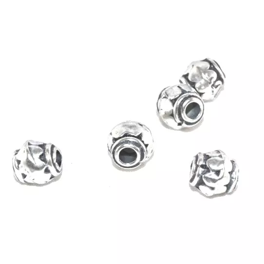 Perles avec motif 7mm trou :  2.90 MM