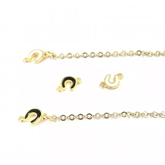 Fer à cheval en intercalaire doré et émaillé - Blanc