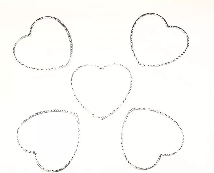 Pendant grand coeur évidé travaillé