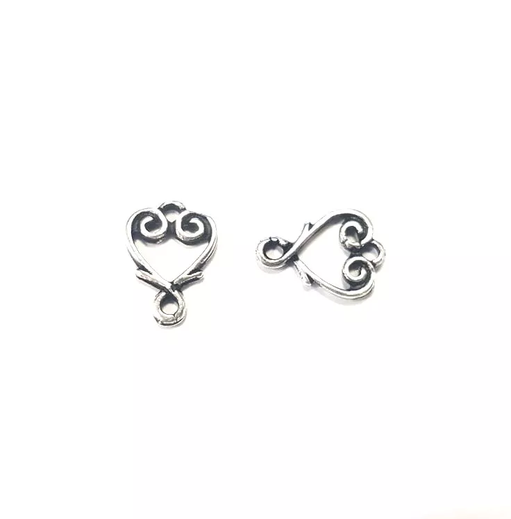 Intercalaire coeur stylisé avec deux anneaux