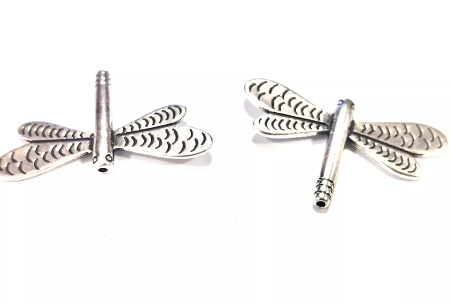 Intercalaire traversant libellule