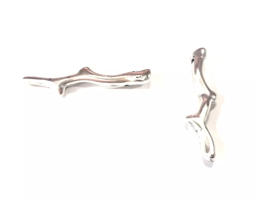 Intercalaire traversant en forme de branche