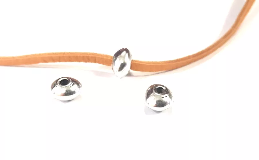 Intercalaire traversant perles irrégulières