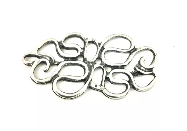 Intercalaire ou pendant forme abstrait 46.7 x 24.3 mm